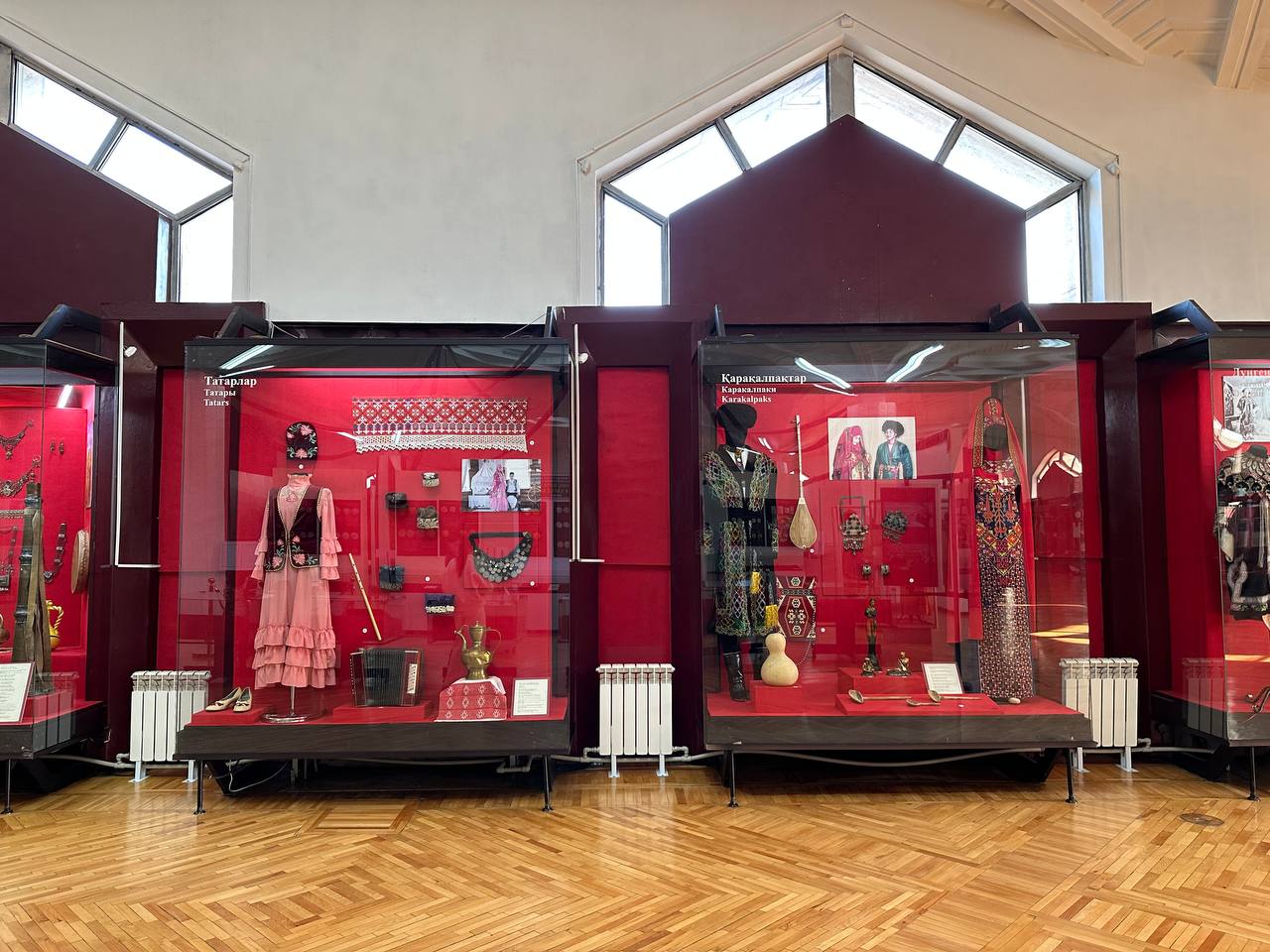 Showcases with national clothes of different nations
